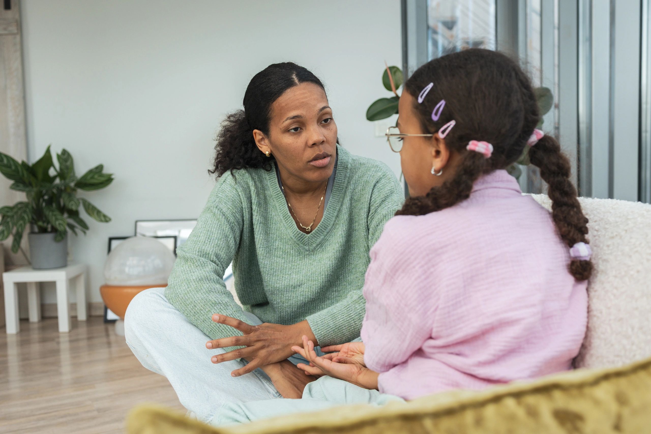 Mother having a supportive conversation with her daughter